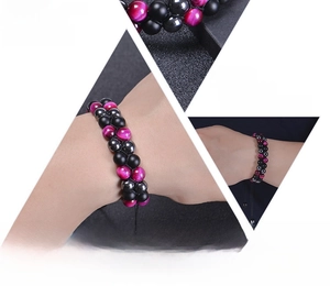 Detailed view of triple-layer braided natural gemstone beads with adjustable drawstring