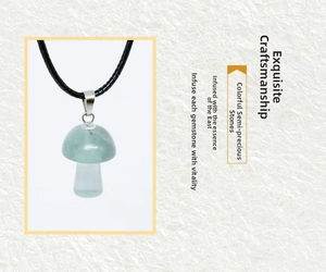 Macro detail of hand-carved mushroom pendant in polished light green semi-precious stone