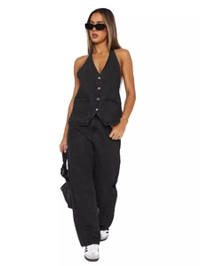 Women's black denim set featuring a halterneck buttoned vest and wide-leg trousers