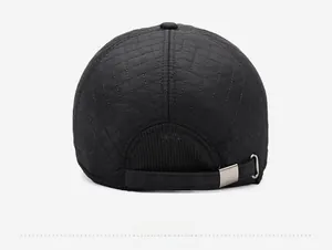 Rear view of black quilted winter baseball cap featuring adjustable strap and metal buckle