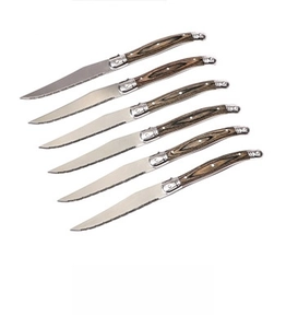 Close-up of 6-piece Laguiole style steak knives with stainless steel blades and faux wood handles