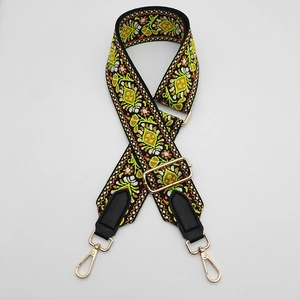 Adjustable ethnic style embroidered canvas bag strap with black leather and gold hooks