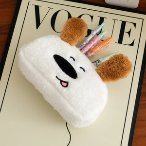 Close-up of the soft plush material and cute cartoon dog face on the large pencil case
