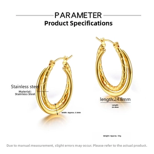 Detail of double-layer stainless steel hoop earrings with textured inner ring and gold finish