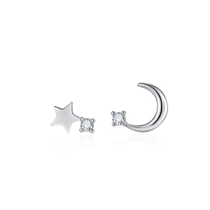Asymmetric silver star and crescent moon stud earrings set with sparkling zircon stones