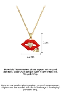 Macro detail of red lip pendant with heart zircon and Kiss engraving on steel chain