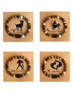 Detailed view of natural stone zodiac bracelets featuring tiger eye and spotted stone beads