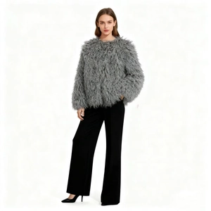 Close-up of grey faux fur coat texture with round neck and long sleeves for women