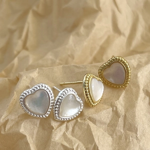 Elegant heart-shaped mother of pearl stud earrings in gold and silver finish