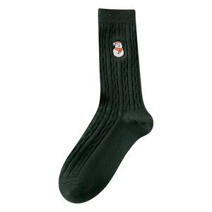Dark green knitted Christmas mid-calf socks with cute snowman embroidery and cable pattern