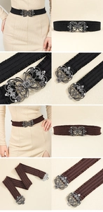 Close-up of rhinestone butterfly buckle and pleated elastic waist belt in black and brown