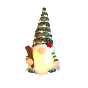 Lighted Christmas gnome doll with knitted hat and plush beard on a white background