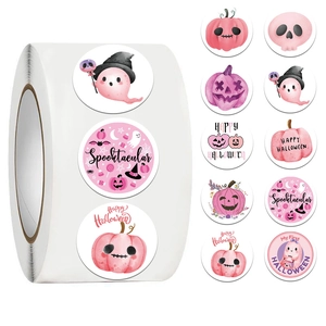 Detailed view of pink Halloween sticker roll with watercolor ghost and pumpkin patterns