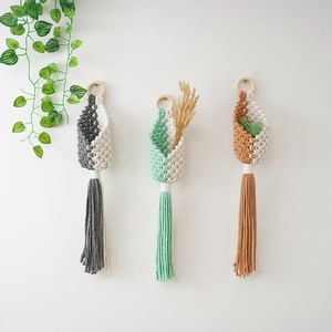Handmade bohemian cotton rope macrame hanging baskets for indoor plants and wall decor