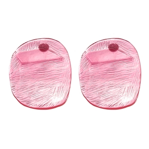 Pink resin geometric stud earrings with irregular brushed texture on a white background