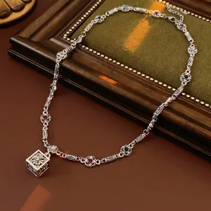 Vintage silver flower necklace with square pendant and multicolored crystals in punk style