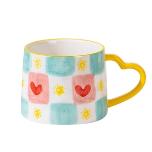 Creative hand-painted heart ceramic mug with pink and blue checkerboard and yellow handle