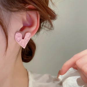 Minimalist pink heart stud earrings with pleated texture and silver needle in French style