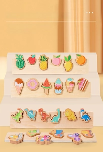 Detailed view of four wooden puzzle boards showing fruits, animals and vehicles themes