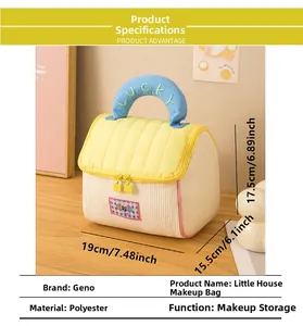 Detail of house-shaped cosmetic bag with quilted yellow lid and Lucky embroidery