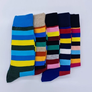 Flat lay of five pairs of colorful striped high-top sports socks in cotton blend