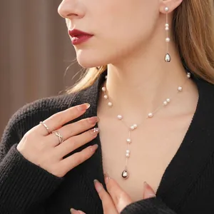 Elegant Y-shaped pearl necklace and drop earring set with silver waterdrop pendants