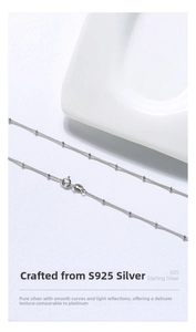 Close-up of S925 sterling silver beaded chain with clear ITALY and S925 hallmark stamps