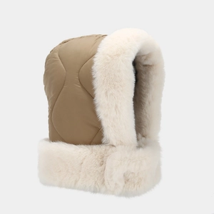 Detail of khaki quilted waterproof winter trapper hat with soft white faux fur lining