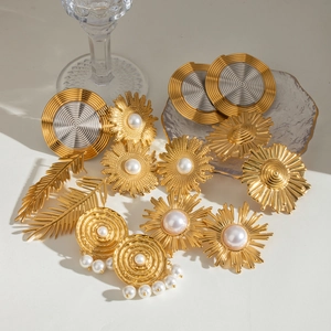 Vintage gold stainless steel jewelry set with pearl inlays and leaf pattern textures