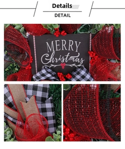 Detail of Christmas wreath with plaid ribbons, red berries and Merry Christmas wooden sign