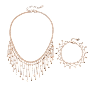 Elegant rose gold fringe tassel jewelry set with layered bead chains and matching bracelet