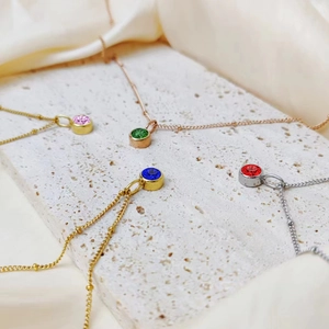 Minimalist gemstone birthstone necklaces in pink blue green red with gold silver plating
