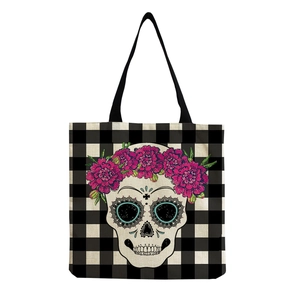 Canvas skull tote bag with checkerboard pattern and pink floral sugar skull print