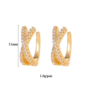 Detail view of 11mm gold earrings with white rhinestones, weighing 1.0g per pair