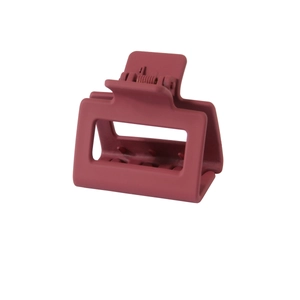 Detail view of burgundy matte square hair claw clip with a durable metal spring
