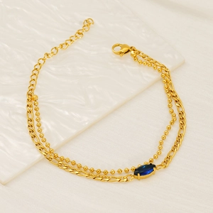 Double-layered 18k gold plated stainless steel bracelet with blue oval zircon gemstone