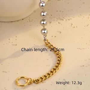 Detail of two-tone gold and silver beaded link chain with toggle clasp, length 29.5cm