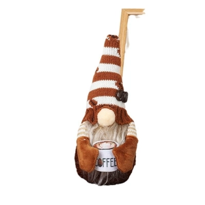 Standing coffee gnome plush figure with brown knitted hat and coffee bean accents