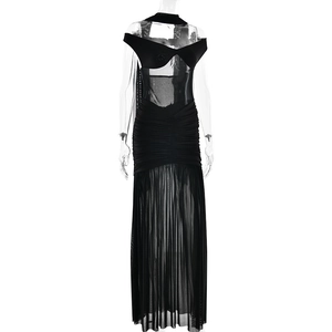 Detail of elegant black strapless dress with ruched mesh patchwork and a slit