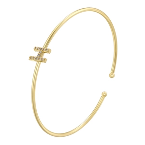 Detailed close-up of a gold-plated open bangle featuring a micro-set zircon H-letter charm
