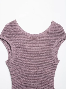 Detail of purple ribbed knit sleeveless top with wide crew neck and textured fabric weave