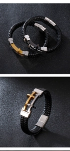 Detail of woven leather bracelets for men featuring stainless steel cross and magnetic clasp