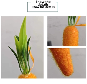 Detailed view of orange flocked Easter carrot with green leaves and a hanging ribbon