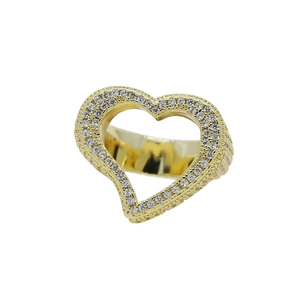 Close-up of golden hollow heart ring featuring micro-pave white zircon stones