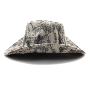 Detail of western cowboy hat featuring grey marble texture and durable wide brim stitching