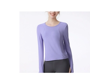 Close-up of lilac quick-dry sports top featuring thumbhole cuffs and a slim fit design