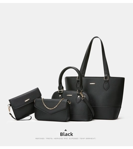 Four-piece black Saffiano leather tote set including shoulder bag and envelope clutch