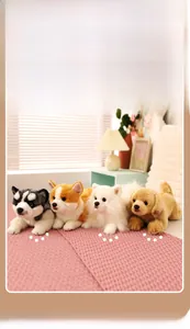 Set of four plush puppy toys including Husky and Corgi on a soft pink knit blanket