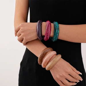 Set of colorful carved acrylic bangles with textured patterns for women in 6 vibrant shades