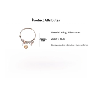 Detail view of heart and butterfly charm bracelet with 5.7cm inner diameter and 23.1g weight